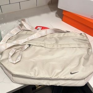 Tan Nike overnight bag